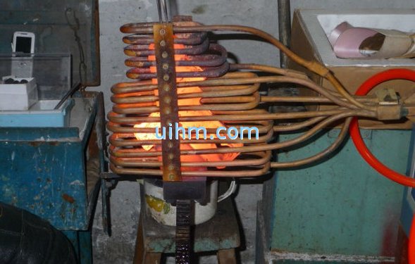 custom-design induction coil for heating steel workpiece