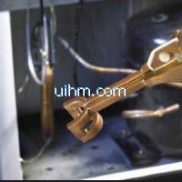 Induction brazing of refrigerator part by custom-design induction coil